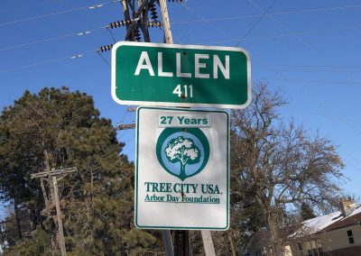 Allen Nebraska town sign with Tree City USA 27 Years marker