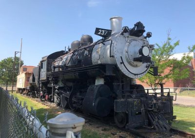 Steam Locomotive No 237 Nebraska Directory Historic black steam locomotive number 237 on display with a caboose