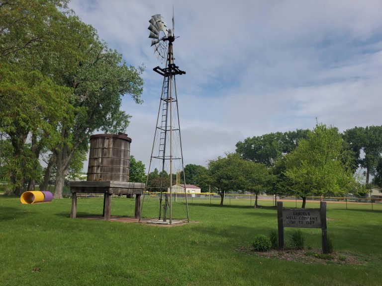 Wooden windmill and water tank in Battle Creek Heritage Park