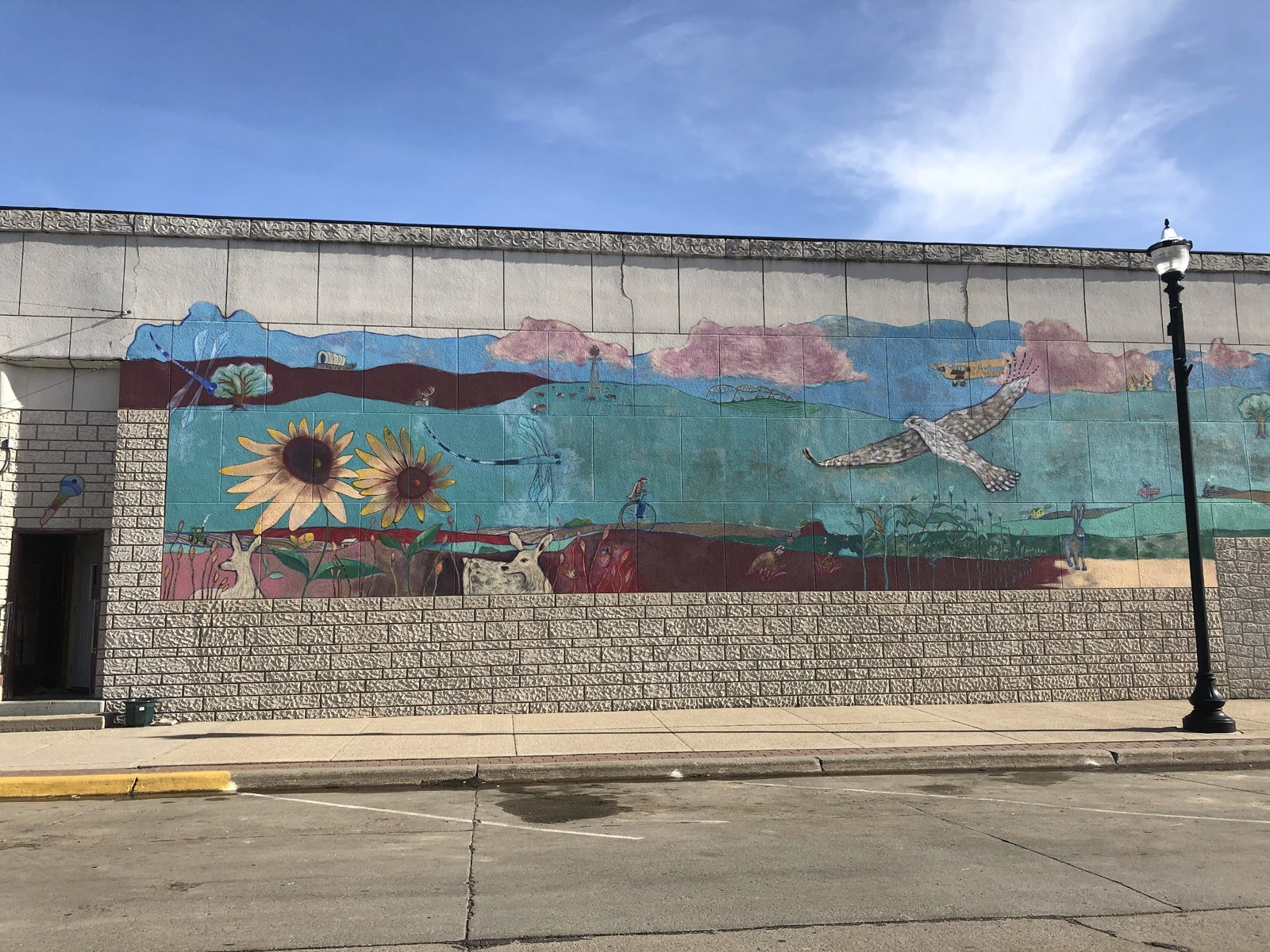 Sunflower and pheasant mural downtown, Plainview, Nebraska Sunflower and pheasant mural downtown, Plainview, Nebraska